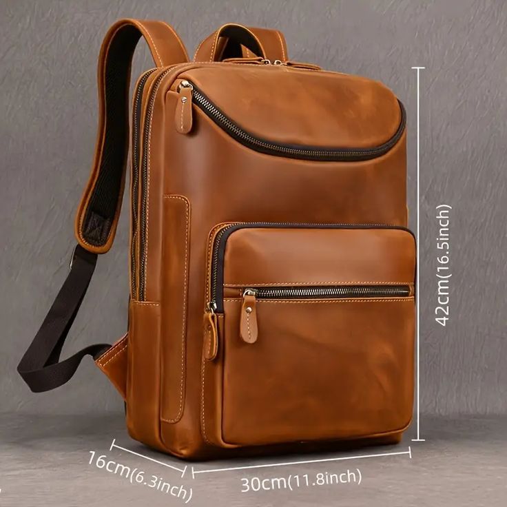 Brown leather backpack with measurements on a gray background