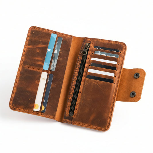 Brown leather wallet with card slots on a white background