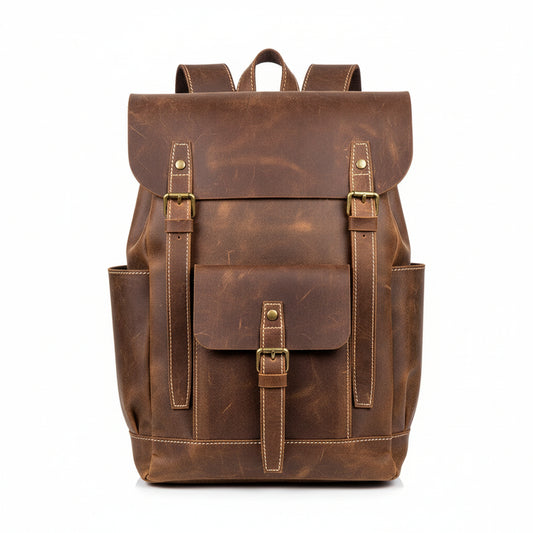 Brown leather backpack on a white background