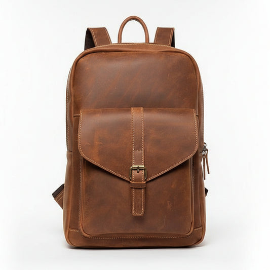 Brown leather backpack on a wooden surface with a brown background